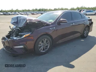 2020 Kia Optima LX z VIN 5XXGT4L34LG436811, wystawiony jako Copart lot #55900995 z przebiegiem 82 087 mil mil oraz Szkoda całkowita • Salvage title. Historia ofert i sprzedaży dostępna na DreamBid. Obrazek 1.