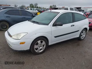 2004 Ford Focus ZX3 with VIN 3FAFP31Z94R120332, listed as a IAAI auction lot 40772071 with 218,128 mi miles and . Bid and sale history available at DreamBid. Image 2.
