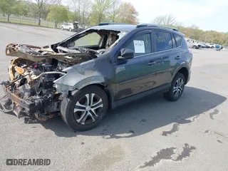 2017 Toyota RAV4 LE with VIN JTMBFREV8HJ171942, listed as a IAAI auction lot 41721673 with 1 mi miles. Bid and sale history available at carsss.com. Image 2.