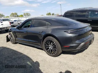 2023 Porsche Taycan with VIN WP0AA2Y18PSA16703, listed as a Copart auction lot 50559135 with 11,428 mi miles and Salvage Title. Bid and sale history available at DreamBid. Image 2.