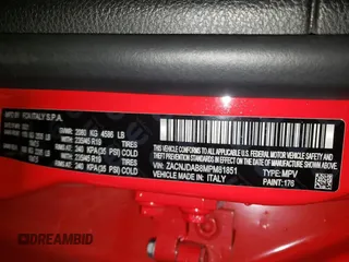 2021 Jeep Renegade Jeepster z VIN ZACNJDAB8MPM81851, wystawiony jako Copart lot #49913615 z przebiegiem 56 130 mil mil oraz Czysty tytuł • Clean title. Historia ofert i sprzedaży dostępna na DreamBid. Obrazek 13.