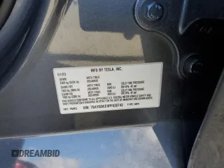 2023 Tesla Model Y Long Range with VIN 7SAYGDEE9PF638742, listed as a Copart auction lot 48188455 with 30,550 mi miles and Salvage Title. Bid and sale history available at DreamBid. Image 12.