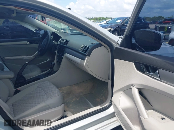2014 Volkswagen Passat S with VIN 1VWAS7A38EC028292, listed as a IAAI auction lot 42357817 with 151,695 mi miles and . Bid and sale history available at DreamBid. Image 5.