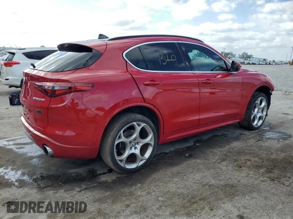 2023 Alfa Romeo Stelvio Ti z VIN ZASPAKBN2P7D65711, wystawiony jako Copart lot #55311535 z przebiegiem 32 906 mil mil oraz Nie do naprawy. Historia ofert i sprzedaży dostępna na DreamBid. Obrazek 3.