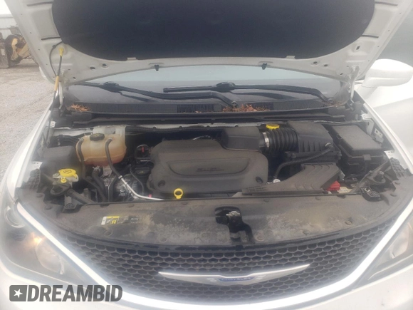 2020 Chrysler Pacifica Touring L with VIN 2C4RC1BG5LR131028, listed as a Copart auction lot 56505555 with 102,972 mi miles and Salvage title. Bid and sale history available at DreamBid. Image 12.