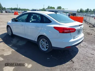 2018 Ford Focus SE with VIN 1FADP3F20JL234829, listed as a IAAI auction lot 42546330 with 101,713 mi miles and . Bid and sale history available at DreamBid. Image 3.
