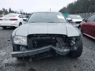 2006 Chrysler 300 C with VIN 2C3KA63H06H286676, listed as a IAAI auction lot 41231230 with 134,565 mi miles. Bid and sale history available at carsss.com. Image 12.