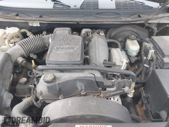 2002 GMC Envoy SLT with VIN 1GKDT13S222143135, listed as a IAAI auction lot 42136672 with 206,064 mi miles. Bid and sale history available at carsss.com. Image 10.