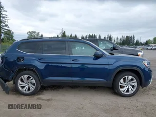 2021 Volkswagen Atlas SE z VIN 1V2WR2CA7MC568779, wystawiony jako IAAI lot #42132709 z przebiegiem 51 205 mil mil oraz . Historia ofert i sprzedaży dostępna na DreamBid. Obrazek 12.