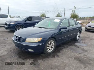 2006 Hyundai Azera SE with VIN KMHFC46F86A110023, listed as a IAAI auction lot 41427898 with 197,837 mi miles and . Bid and sale history available at DreamBid. Image 17.