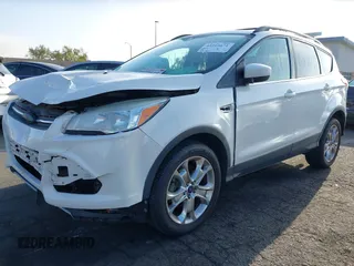 2013 Ford Escape SE with VIN 1FMCU0GX3DUB96899, listed as a IAAI auction lot 42266671 with 92,181 mi miles and . Bid and sale history available at DreamBid. Image 2.