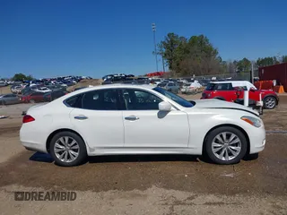 2011 Infiniti M with VIN JN1BY1AP8BM325061, listed as a IAAI auction lot 41765214 with 289,990 mi miles and . Bid and sale history available at DreamBid. Image 13.