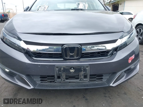 2018 Honda Clarity Plug-In Hybrid with VIN JHMZC5F14JC017006, listed as a IAAI auction lot 42064754 with 36,976 mi miles. Bid and sale history available at carsss.com. Image 6.