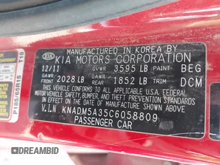 2012 Kia Rio LX with VIN KNADM5A35C6058809, listed as a IAAI auction lot 42052025 with 124,266 mi miles. Bid and sale history available at carsss.com. Image 9.