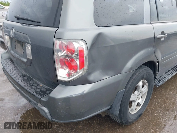 2008 Honda Pilot EX-L with VIN 5FNYF28548B007852, listed as a IAAI auction lot 42387060 with 261,023 mi miles and . Bid and sale history available at DreamBid. Image 13.