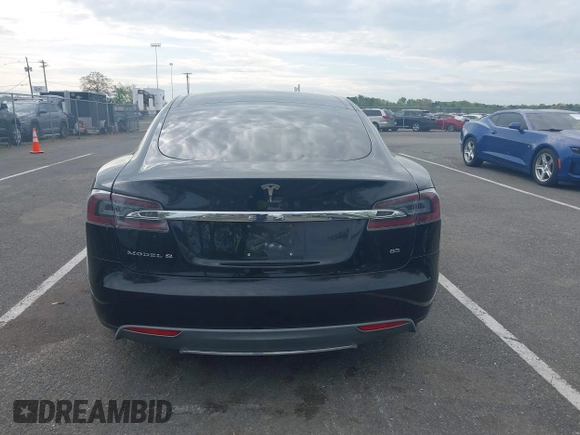 2014 Tesla Model S 60 with VIN 5YJSA1H13EFP33693, listed as a IAAI auction lot 42132094 with Not Provided miles and . Bid and sale history available at DreamBid. Image 15.