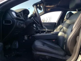 2018 Maserati Ghibli S Q4 z VIN ZAM57YTA5J1279909, wystawiony jako Copart lot #54559285 z przebiegiem 49 065 mil mil oraz Szkoda całkowita • Salvage title. Historia ofert i sprzedaży dostępna na DreamBid. Obrazek 7.
