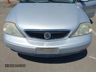 2002 Mercury Sable GS z VIN 1MEFM50U72A624825, wystawiony jako IAAI lot #42463081 z przebiegiem 88 873 mil mil oraz . Historia ofert i sprzedaży dostępna na DreamBid. Obrazek 6.
