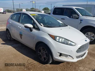 2016 Ford Fiesta SE z VIN 3FADP4EJ5GM136658, wystawiony jako IAAI lot #41312966 z przebiegiem 145 561 mil mil oraz . Historia ofert i sprzedaży dostępna na DreamBid. Obrazek 1.