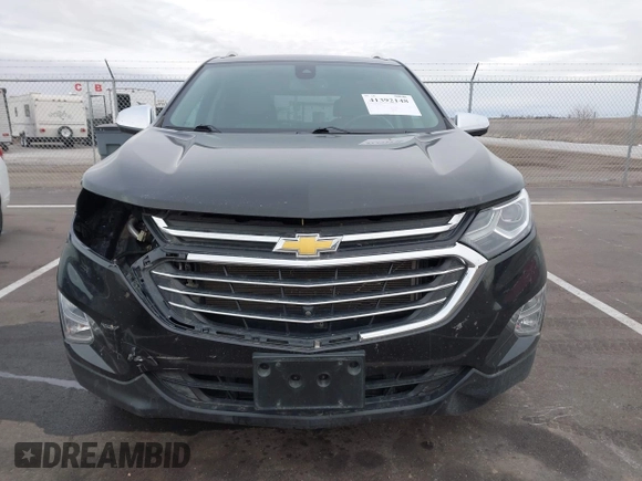 2021 Chevrolet Equinox Premier z VIN 2GNAXXEV4M6118442, wystawiony jako IAAI lot #41392148 z przebiegiem 92 170 mil mil oraz . Historia ofert i sprzedaży dostępna na DreamBid. Obrazek 13.