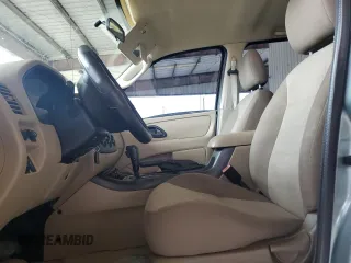 2007 Ford Escape XLS with VIN 1FMYU02Z37KB35521, listed as a Copart auction lot 76533554 with 142,762 mi miles and Salvage Title. Bid and sale history available at carsss.com. Image 7.