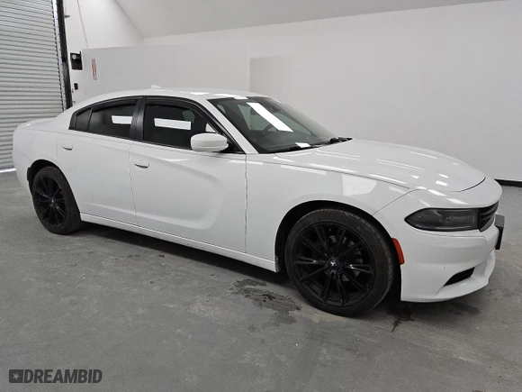 2015 Dodge Charger SXT with VIN 2C3CDXHG6FH754332, listed as a Copart auction lot 49621245 with 191,927 mi miles and Clean Title. Bid and sale history available at carsss.com. Image 4.