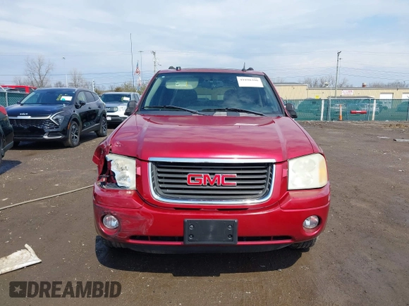 2005 GMC Envoy SLE with VIN 1GKDT13S252127604, listed as a IAAI auction lot 41898390 with 210,655 mi miles. Bid and sale history available at carsss.com. Image 12.