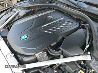 2022 BMW 4 Series M440i xDrive with VIN WBA13AR04NCK77385, listed as a IAAI auction lot 43099478 with 50,502 mi miles and . Bid and sale history available at DreamBid. Image 19.