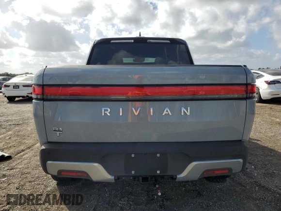 2023 Rivian R1T Adventure with VIN 7FCTGBAA2PN028983, listed as a Copart auction lot 45307015 with 220 mi miles and Salvage Title. Bid and sale history available at DreamBid. Image 6.