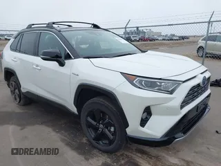 2021 Toyota RAV4 Hybrid XSE with VIN 2T3E6RFV4MW021009, listed as a IAAI auction lot 41940278 with 33,016 mi miles and . Bid and sale history available at DreamBid. Image 1.