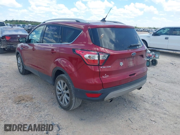 2018 Ford Escape Titanium with VIN 1FMCU0J96JUD58854, listed as a IAAI auction lot 42590609 with 77,825 mi miles and . Bid and sale history available at DreamBid. Image 3.
