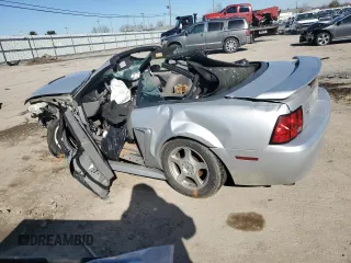 2003 Ford Mustang Deluxe with VIN 1FAFP44493F395992, listed as a Copart auction lot 41692825 with 0 mi miles and Salvage Title. Bid and sale history available at carsss.com. Image 2.