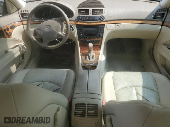 2003 Mercedes-Benz E-Class 3.2L with VIN WDBUF65JX3A313638, listed as a Copart auction lot 70869194 with 142,524 mi miles and Salvage Title. Bid and sale history available at carsss.com. Image 8.