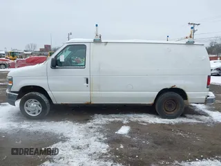 2011 Ford Econoline Cargo Commercial with VIN 1FTNE1EWXBDA35585, listed as a IAAI auction lot 41349320 with 122,311 mi miles and . Bid and sale history available at carsss.com. Image 14.
