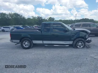 2001 Ford F-150 XL with VIN 1FTZX17291NB54615, listed as a IAAI auction lot 42661176 with 265,836 mi miles and . Bid and sale history available at DreamBid. Image 14.
