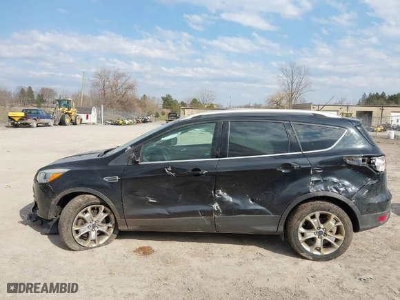 2014 Ford Escape Titanium with VIN 1FMCU9JXXEUE45634, listed as a IAAI auction lot 41840303 with 109,692 mi miles. Bid and sale history available at carsss.com. Image 6.