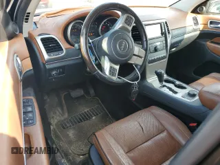 2011 Jeep Grand Cherokee Overland Summit with VIN 1J4RR6GT3BC686143, listed as a Copart auction lot 59218685 with 155,059 mi miles and Salvage title. Bid and sale history available at DreamBid. Image 8.