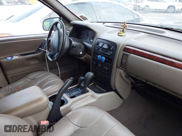 2000 Jeep Grand Cherokee Laredo with VIN 1J4GW48N2YC187623, listed as a IAAI auction lot 41311495 with 121,831 mi miles and . Bid and sale history available at DreamBid. Image 5.