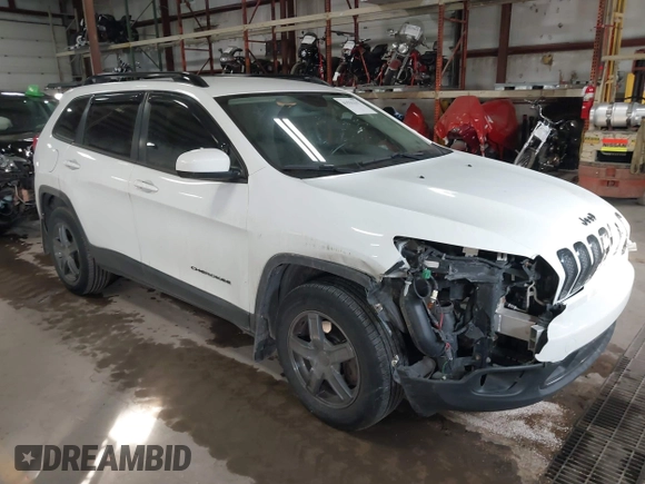 2014 Jeep Cherokee Latitude with VIN 1C4PJMCS5EW288909, listed as a IAAI auction lot 41531117 with 108,971 mi miles and . Bid and sale history available at DreamBid. Image 1.