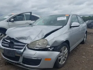2007 Volkswagen Jetta Wolfsburg Edition z VIN 3VWEF71K77M166713, wystawiony jako IAAI lot #42746458 z przebiegiem 214 241 mil mil oraz . Historia ofert i sprzedaży dostępna na DreamBid. Obrazek 17.