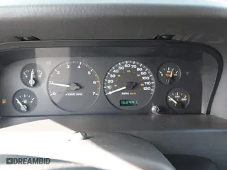 1999 Jeep Grand Cherokee Laredo with VIN 1J4GW58S6XC524451, listed as a IAAI auction lot 41741007 with 162,441 mi miles. Bid and sale history available at carsss.com. Image 7.