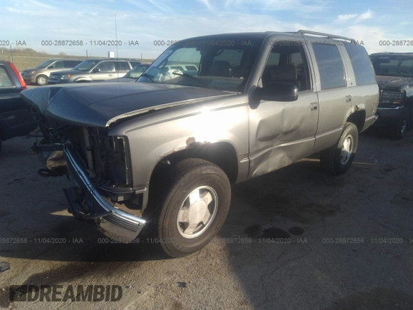 1999 Chevrolet Tahoe Z71 with VIN 1GNEK13R7XJ528100, listed as a IAAI auction lot 28872658 with 158,958 mi miles and . Bid and sale history available at DreamBid. Image 2.