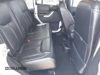 2014 Jeep Wrangler Unlimited Sahara with VIN 1C4BJWEG6EL203866, listed as a IAAI auction lot 41846091 with 105,296 mi miles. Bid and sale history available at carsss.com. Image 8.