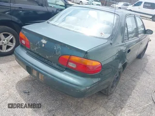 2000 Chevrolet Prizm LSi z VIN 1Y1SK5285YZ407771, wystawiony jako IAAI lot #42240643 z przebiegiem 237 408 mil mil oraz . Historia ofert i sprzedaży dostępna na DreamBid. Obrazek 4.