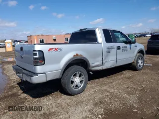 2005 Ford F-150 XLT with VIN 1FTPX14565FA67745, listed as a Copart auction lot 50020275 with 171,517 mi miles and Salvage Title. Bid and sale history available at carsss.com. Image 3.