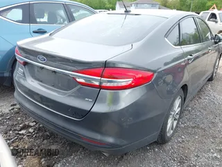 2017 Ford Fusion SE with VIN 3FA6P0H74HR125124, listed as a IAAI auction lot 42169417 with 121,069 mi miles and . Bid and sale history available at DreamBid. Image 4.