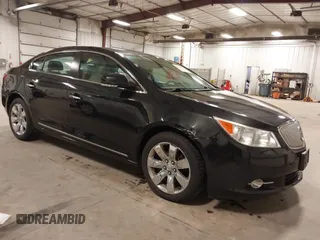 2012 Buick LaCrosse Premium 1 with VIN 1G4GD5E3XCF136619, listed as a IAAI auction lot 41933336 with 140,401 mi miles. Bid and sale history available at carsss.com. Image 1.
