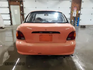 1997 Hyundai Accent z VIN KMHVD14NXVU221266, wystawiony jako Copart lot #86383044 z przebiegiem 159 517 mil mil oraz Szkody całkowita. Historia ofert i sprzedaży dostępna na DreamBid. Obrazek 6.