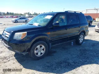 2008 Honda Pilot VP with VIN 5FNYF18228B048870, listed as a IAAI auction lot 41875026 with 195,542 mi miles. Bid and sale history available at carsss.com. Image 2.