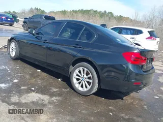 2018 BMW 3 Series 320i with VIN WBA8A9C58JAH13719, listed as a IAAI auction lot 41651935 with 85,137 mi miles. Bid and sale history available at carsss.com. Image 3.